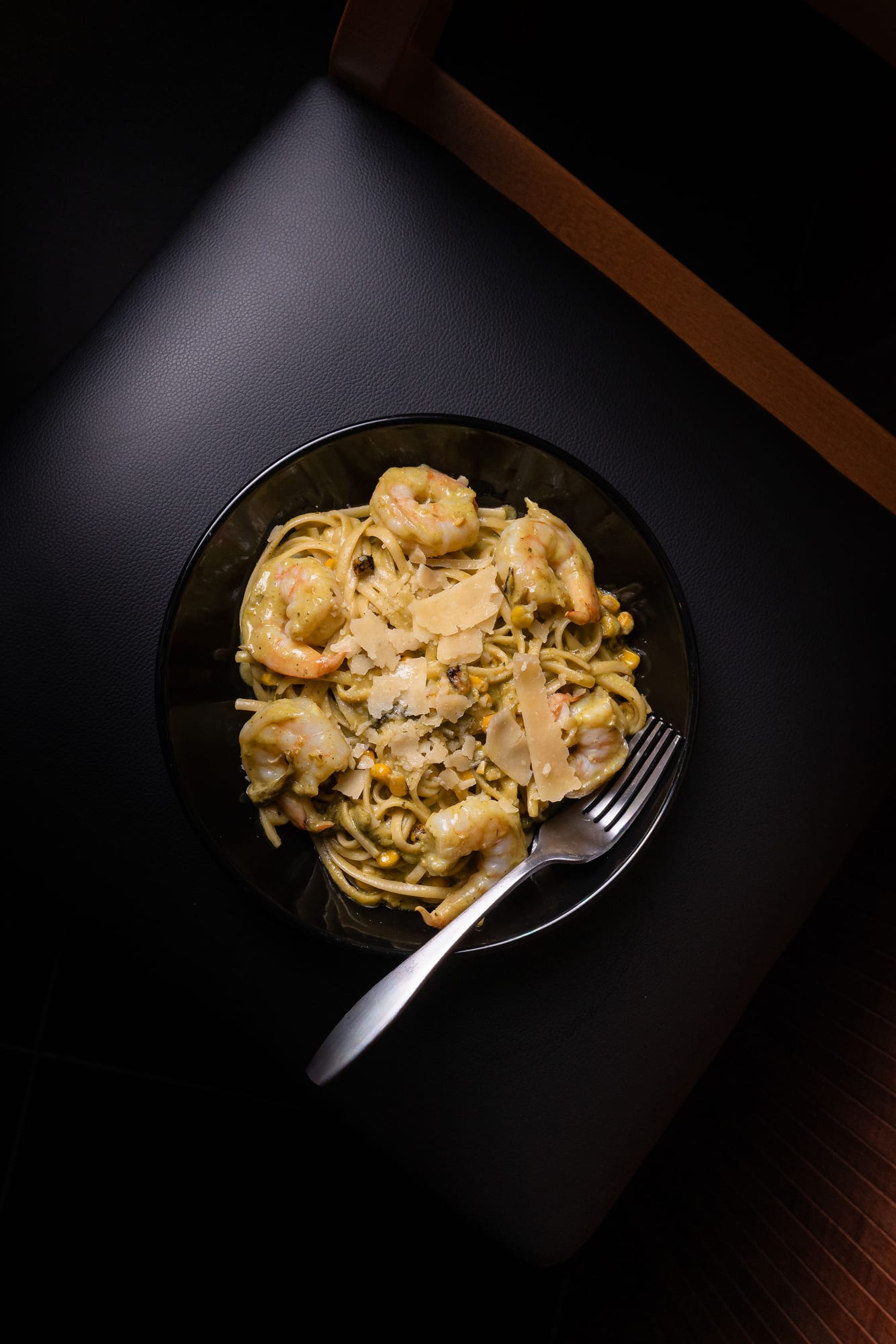 Creamy fettuccine finished with shaved parmesan