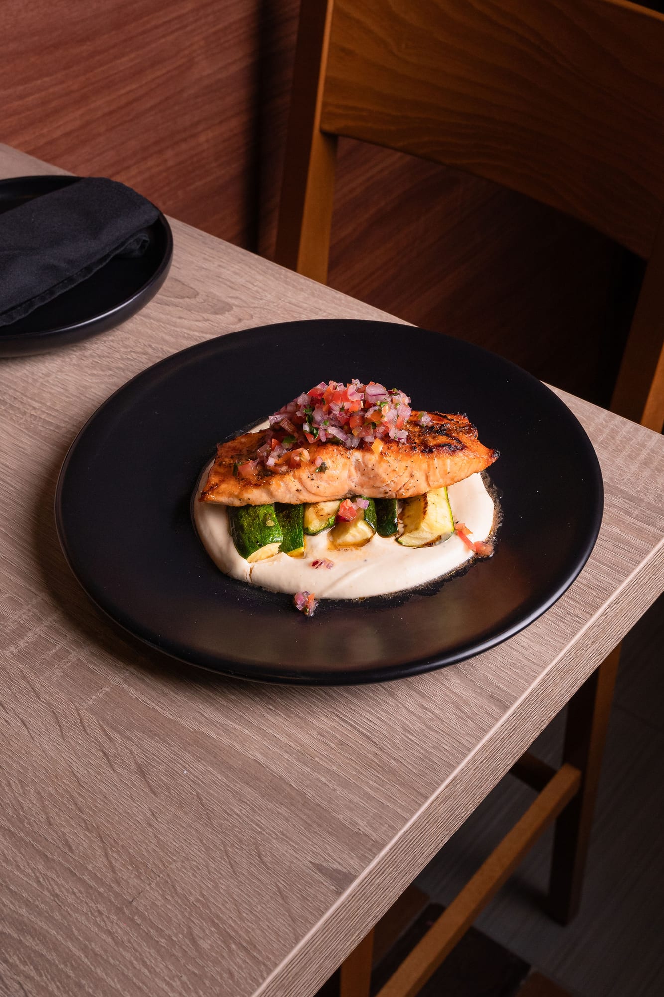 Seared salmon over whipped potato with salsa and asparagus