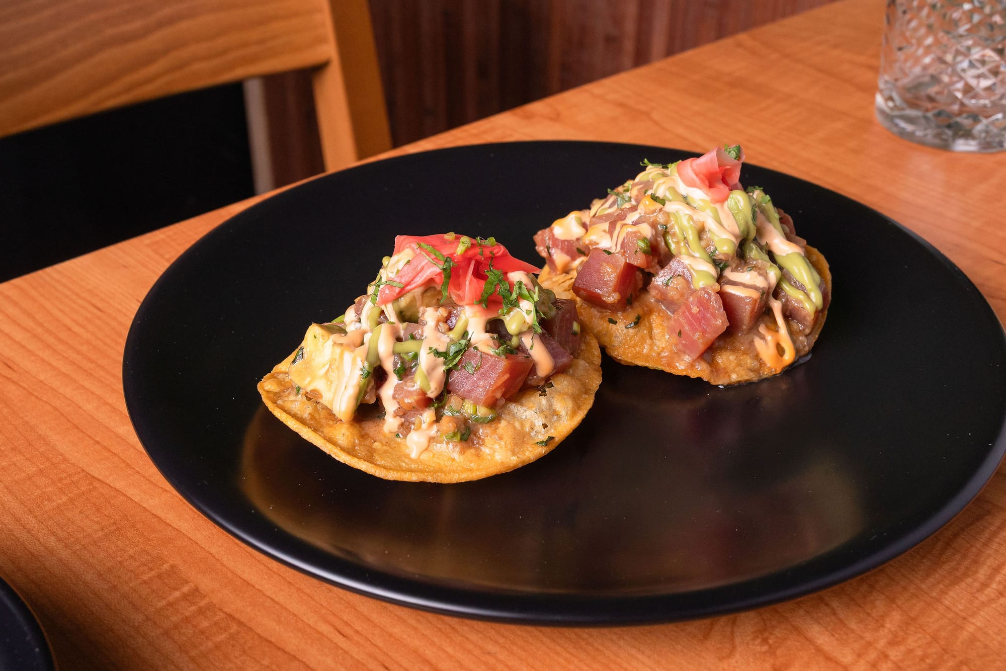 Seared tuna tostadas topped with avocado and pico de gallo